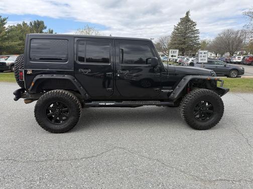 Black Clearcoat 2011 Jeep Wrangler Unlimited Sport