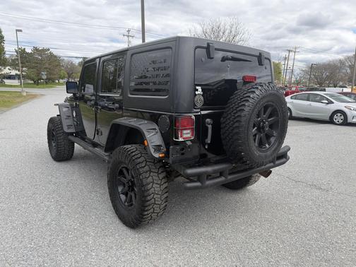Black Clearcoat 2011 Jeep Wrangler Unlimited Sport