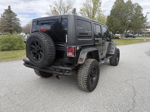 Black Clearcoat 2011 Jeep Wrangler Unlimited Sport