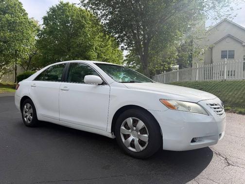 Super White 2009 Toyota Camry LE