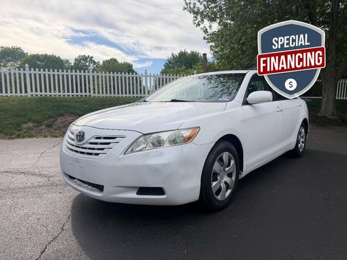 Super White 2009 Toyota Camry LE