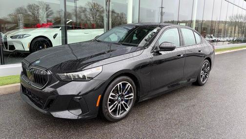 Black Sapphire Metallic 2026 BMW 550e xDrive