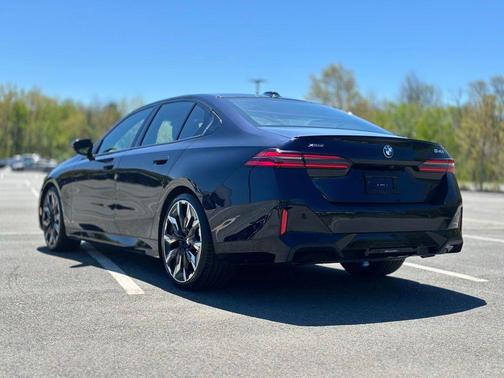 Carbon Black Metallic 2024 BMW 540 i xDrive