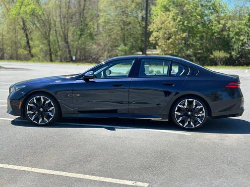 Carbon Black Metallic 2024 BMW 540 i xDrive