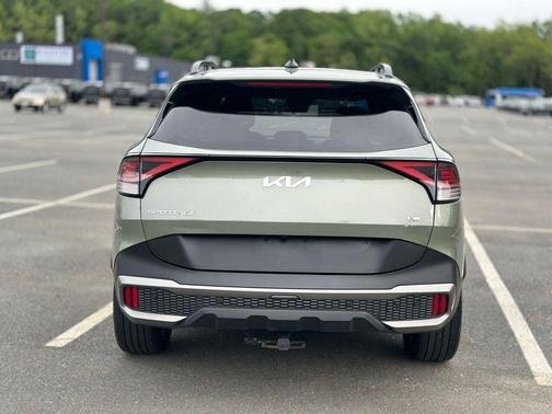 Jungle Green 2023 Kia Sportage Plug-In Hybrid X-Line