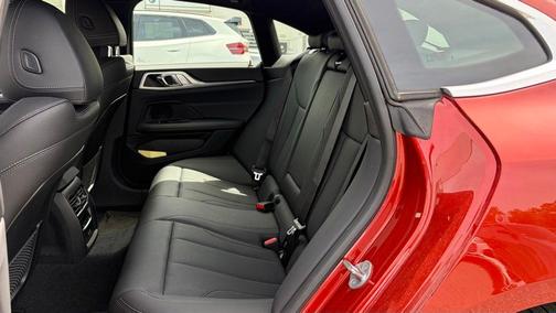 Sunset Orange Metallic 2024 BMW i4 Gran Coupe xDrive40
