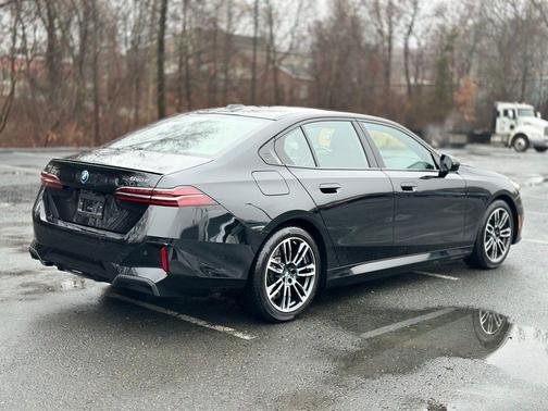 Black Sapphire Metallic 2026 BMW 550e xDrive