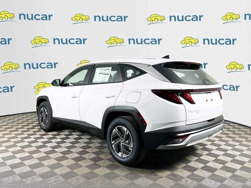 Creamy White Pearl 2026 Hyundai TUCSON Hybrid Blue SE