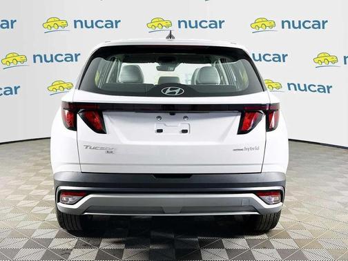Creamy White Pearl 2026 Hyundai TUCSON Hybrid Blue SE