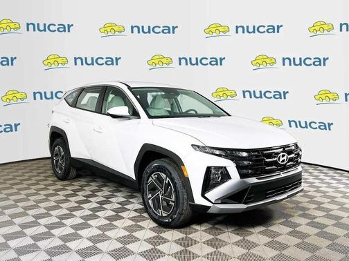 Creamy White Pearl 2026 Hyundai TUCSON Hybrid Blue SE
