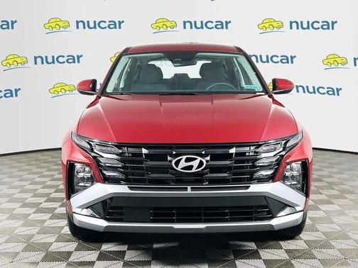 Ultimate Red 2026 Hyundai TUCSON Hybrid Blue SE