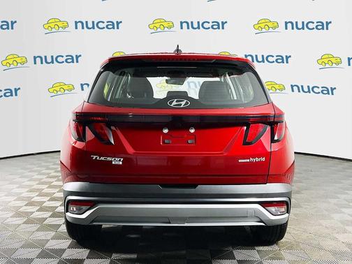Ultimate Red 2026 Hyundai TUCSON Hybrid Blue SE