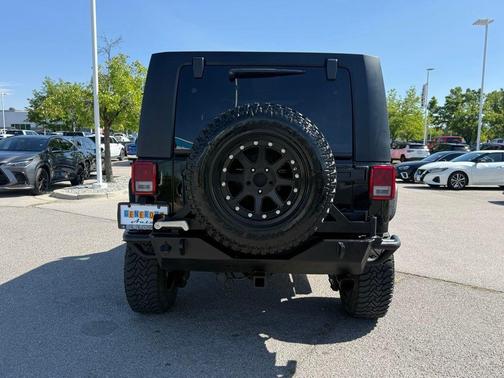 Black Clearcoat / Black Soft Top 2009 Jeep Wrangler Unlimited Sahara