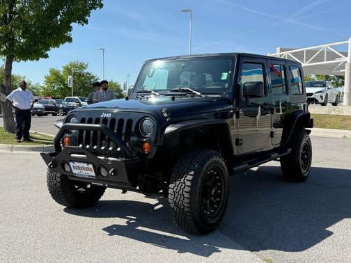 Black Clearcoat / Black Soft Top 2009 Jeep Wrangler Unlimited Sahara