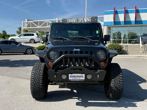 Black Clearcoat / Black Soft Top 2009 Jeep Wrangler Unlimited Sahara