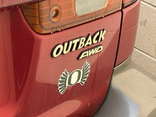 Red 1997 Subaru Legacy Outback AWD