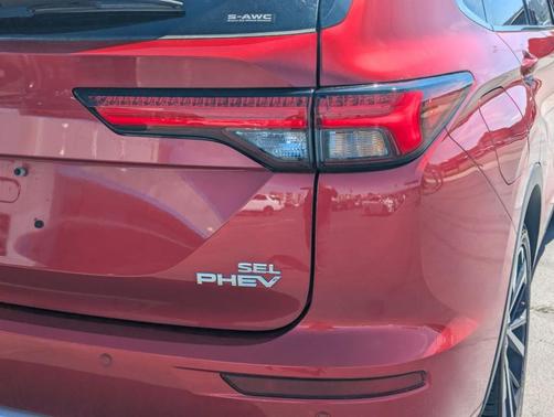 Red 2025 Mitsubishi Outlander PHEV