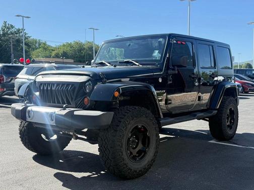 Black Clearcoat 2012 Jeep Wrangler Unlimited Sahara
