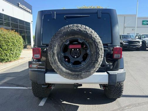 Black Clearcoat 2012 Jeep Wrangler Unlimited Sahara
