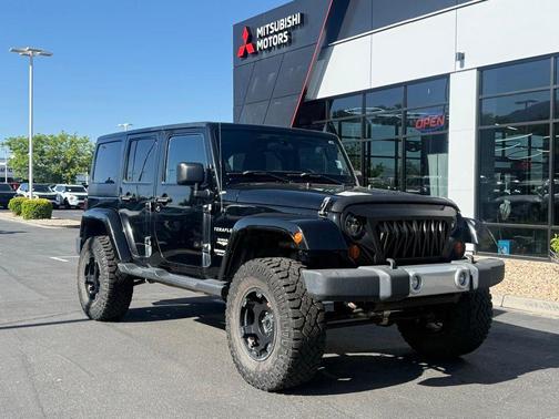 Black Clearcoat 2012 Jeep Wrangler Unlimited Sahara