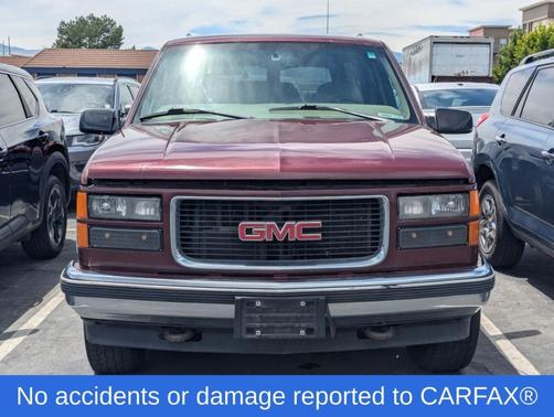 Dark Toreador Red Metallic 1999 GMC Suburban SLT