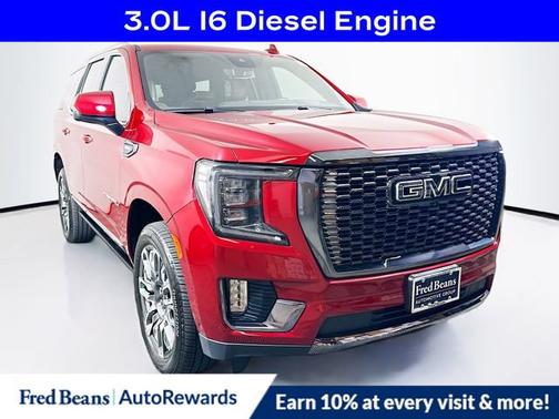 Volcanic Red Tintcoat 2024 GMC Yukon Denali Ultimate SUV