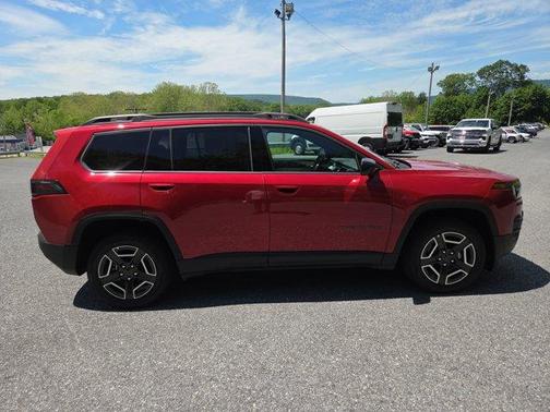 Red 2026 Jeep Cherokee Laredo