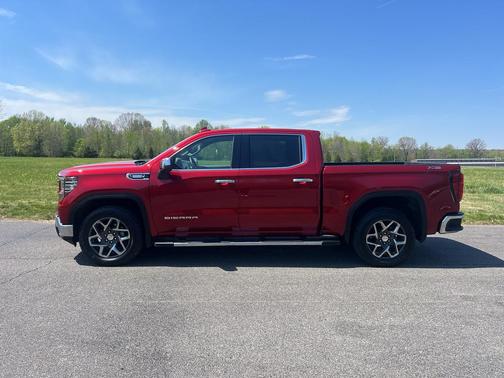 Volcanic Red Tintcoat 2026 GMC Sierra 1500 SLT