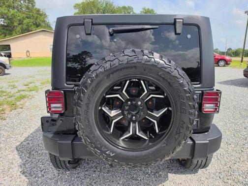 Black 2016 Jeep Wrangler Unlimited Sport