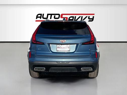 Deep Sea Metallic 2024 Cadillac XT4 Premium Luxury