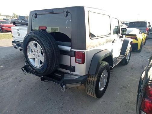 Bright Silver Metallic Clearcoat 2010 Jeep Wrangler Sport
