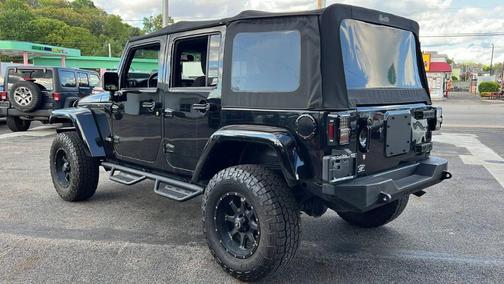 Black 2013 Jeep Wrangler Unlimited Sahara