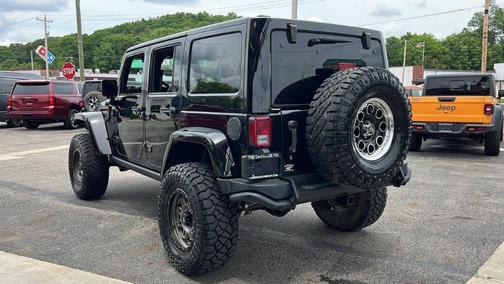 Black 2016 Jeep Wrangler Unlimited Sahara