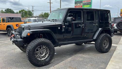 Black 2016 Jeep Wrangler Unlimited Sahara
