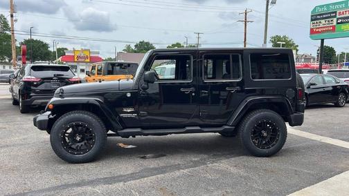 Black 2015 Jeep Wrangler Unlimited Sahara