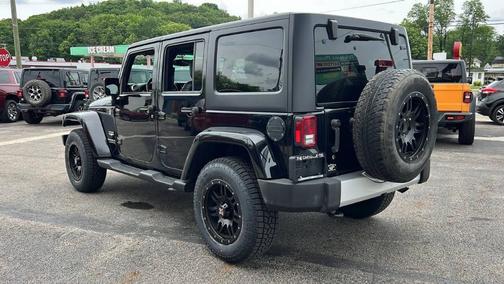 Black 2015 Jeep Wrangler Unlimited Sahara