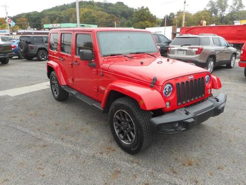 Red 2015 Jeep Wrangler Unlimited Sahara