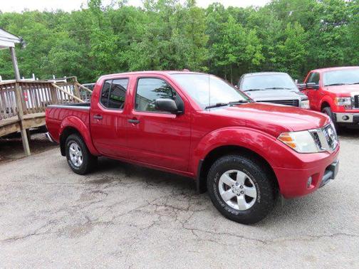 Red 2012 Nissan Frontier SV