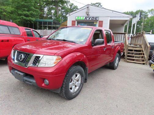 Red 2012 Nissan Frontier SV