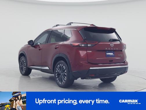 Red 2026 Nissan Rogue Platinum
