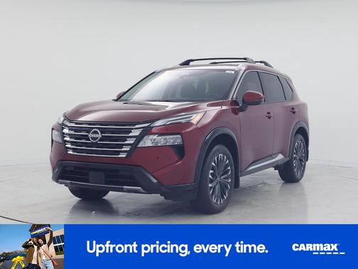 Red 2026 Nissan Rogue Platinum