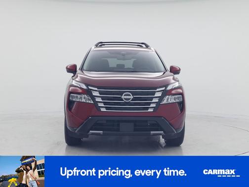 Red 2026 Nissan Rogue Platinum