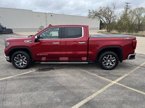 Volcanic Red Tintcoat 2025 GMC Sierra 1500 SLT