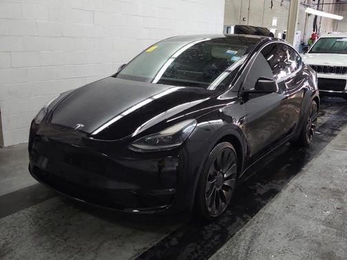 Solid Black 2023 Tesla Model Y Performance