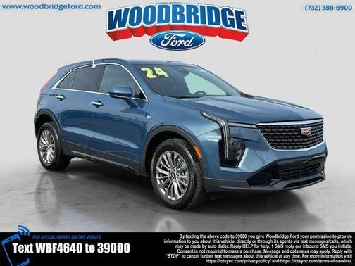 Blue 2024 Cadillac XT4 Premium Luxury