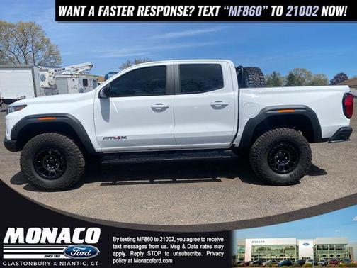 Summit White 2024 GMC Canyon AT4X