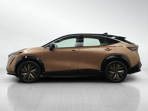 Sunrise Copper Pearl/Black Diamond Pearl 2023 Nissan ARIYA PREMIERE