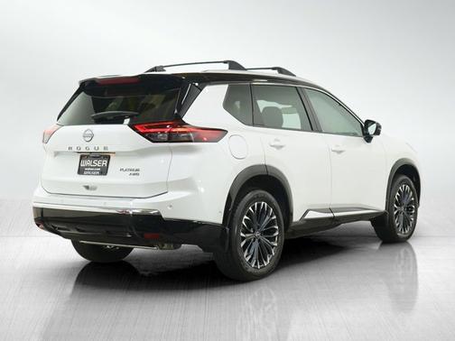 Everest White Pearl/Super Black 2025 Nissan Rogue Platinum