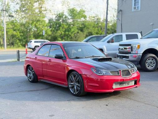 Red 2006 Subaru Impreza WRX Sti
