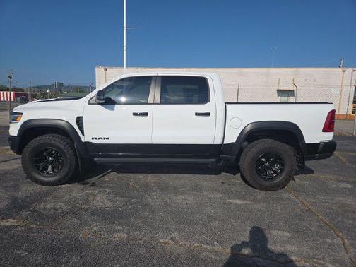 Bright White Clearcoat 2026 RAM 1500 RHO Crew Cab 4x4 5'7' Box